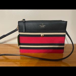 Kate Spade small red and black crossbody purse.